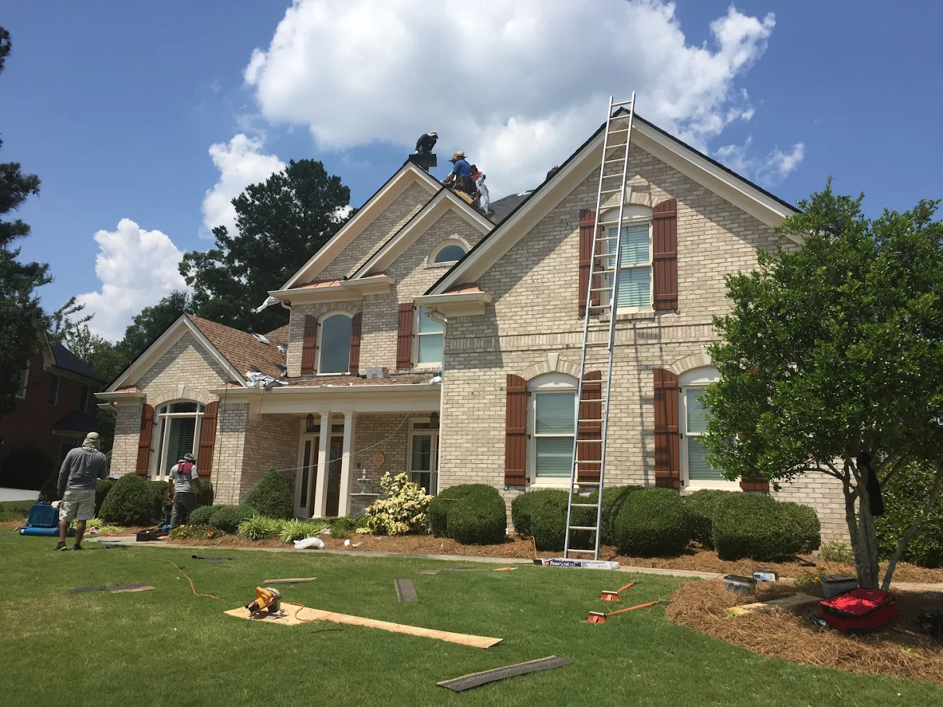 House with ladder and roof work