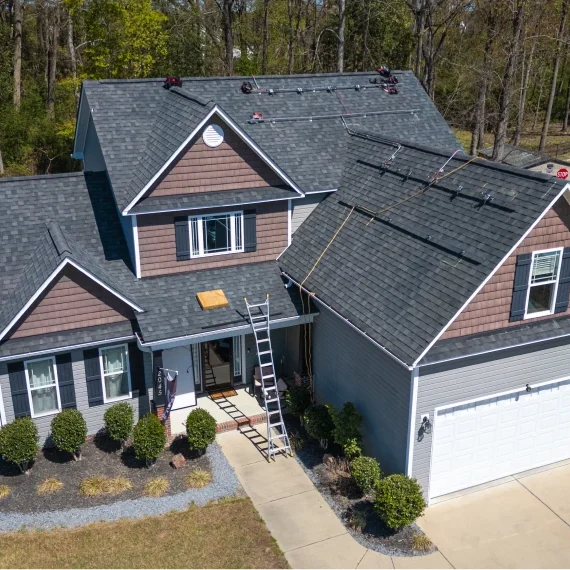 Two-story house with garage and garden